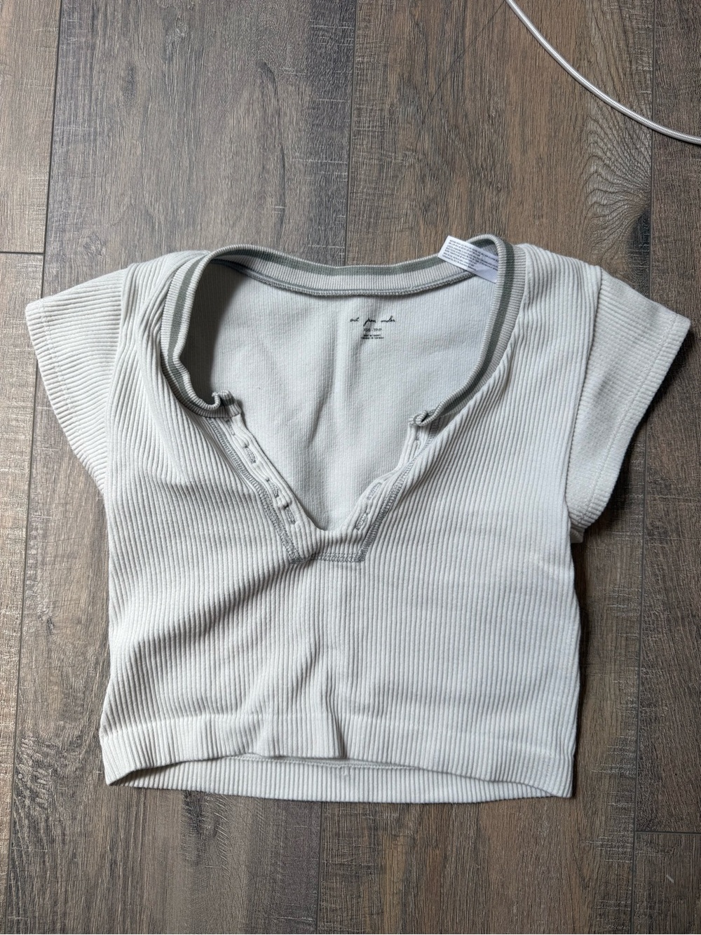 Urban Outfitters out from under shirt